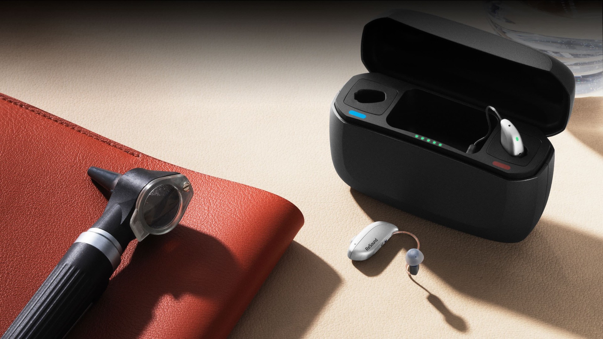 Discreet behind-the-ear hearing aid fitted by Prestige Hearing